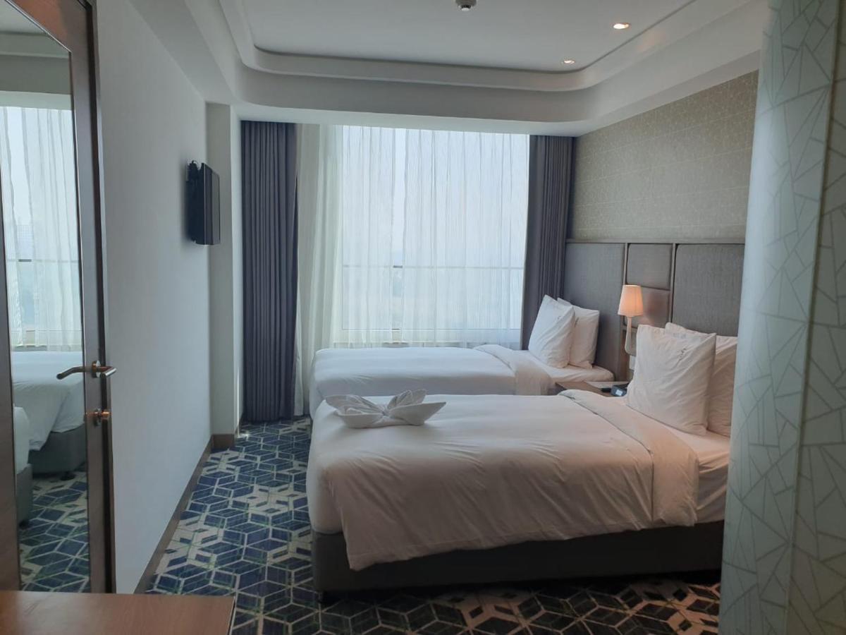 ホリデー イン グルグラム セクター 90 グルガウン エクステリア 写真 A room at the hotel