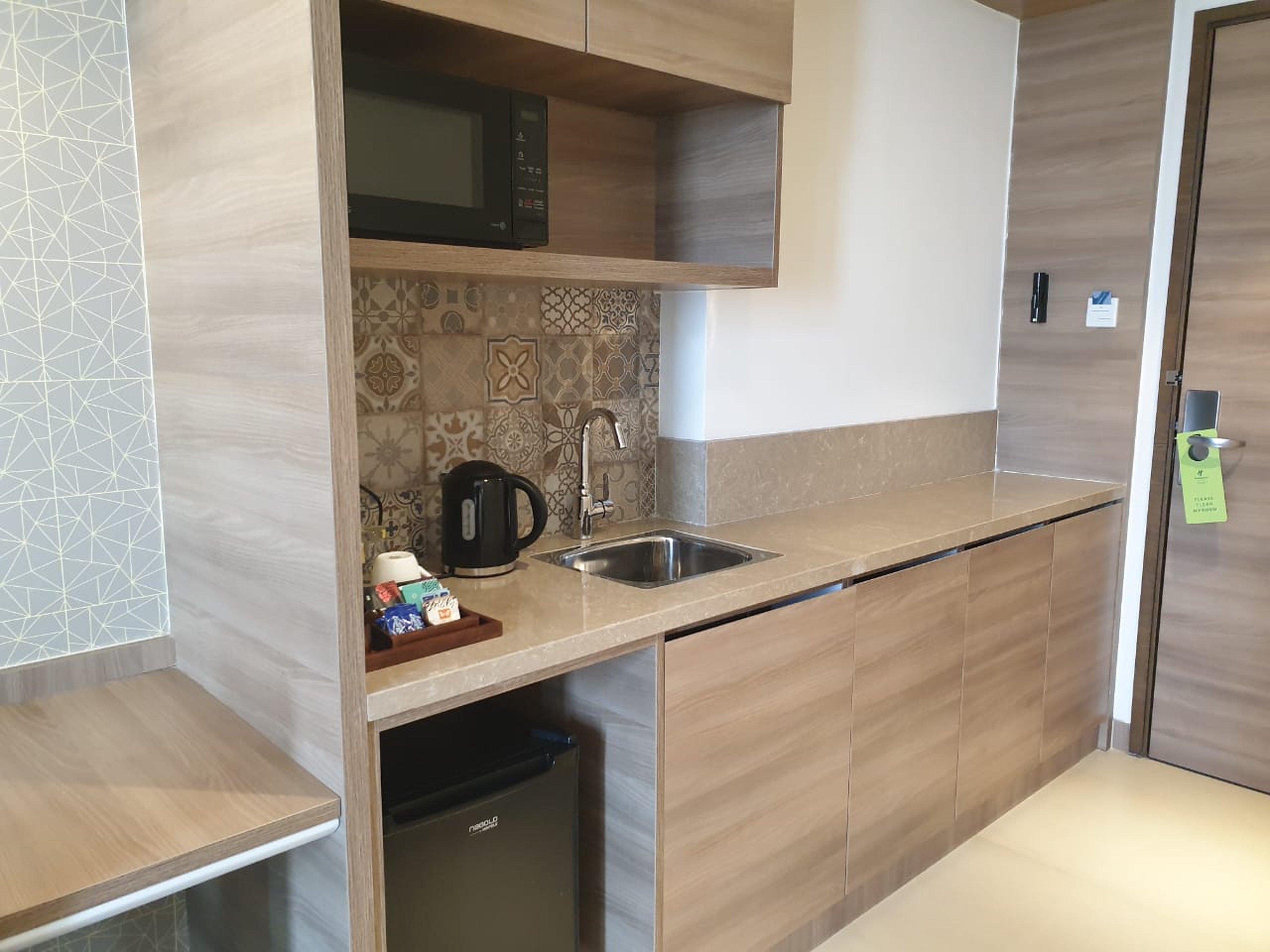 ホリデー イン グルグラム セクター 90 グルガウン エクステリア 写真 A kitchenette in a hotel room
