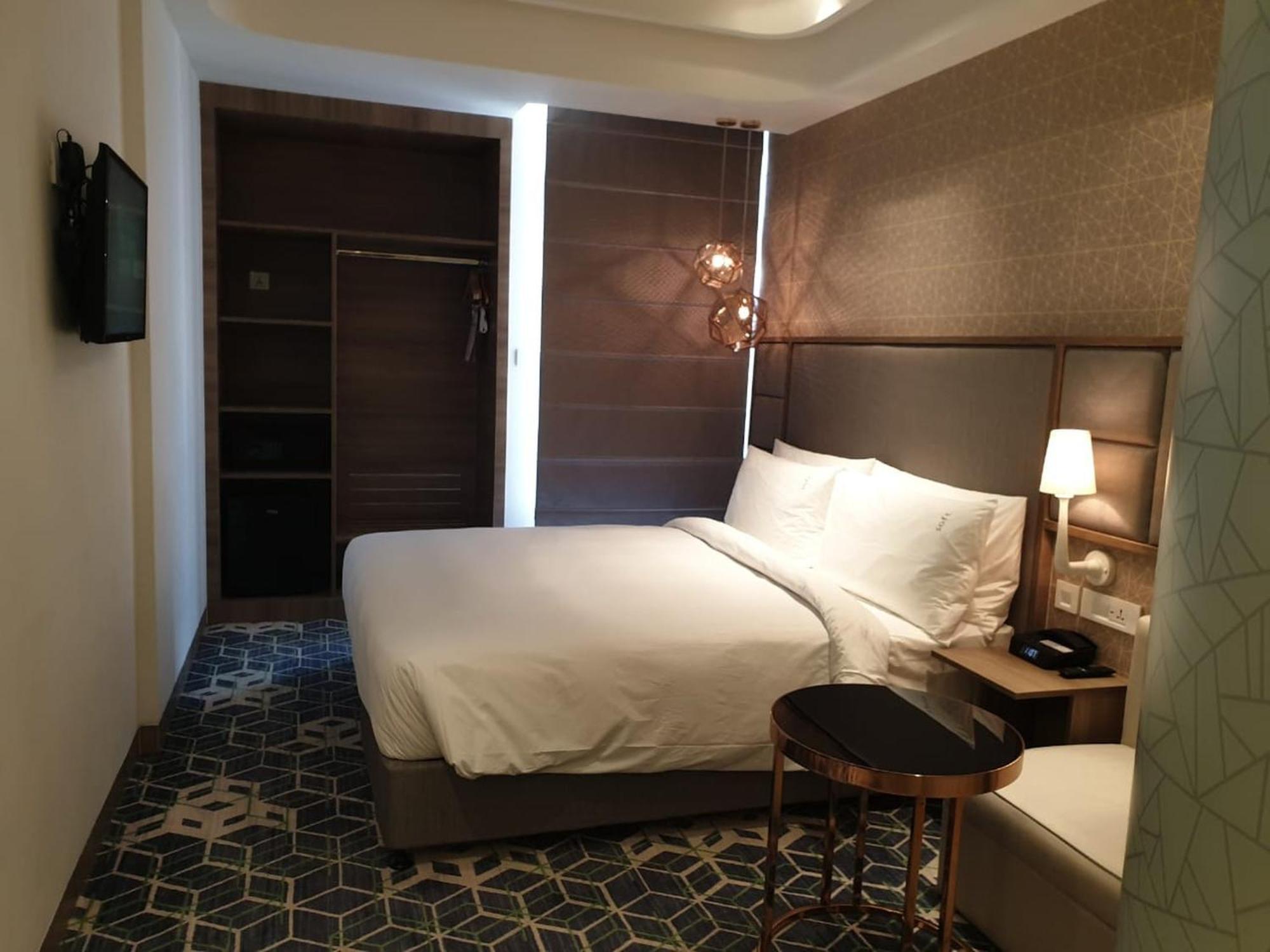 ホリデー イン グルグラム セクター 90 グルガウン エクステリア 写真 A room at the hotel